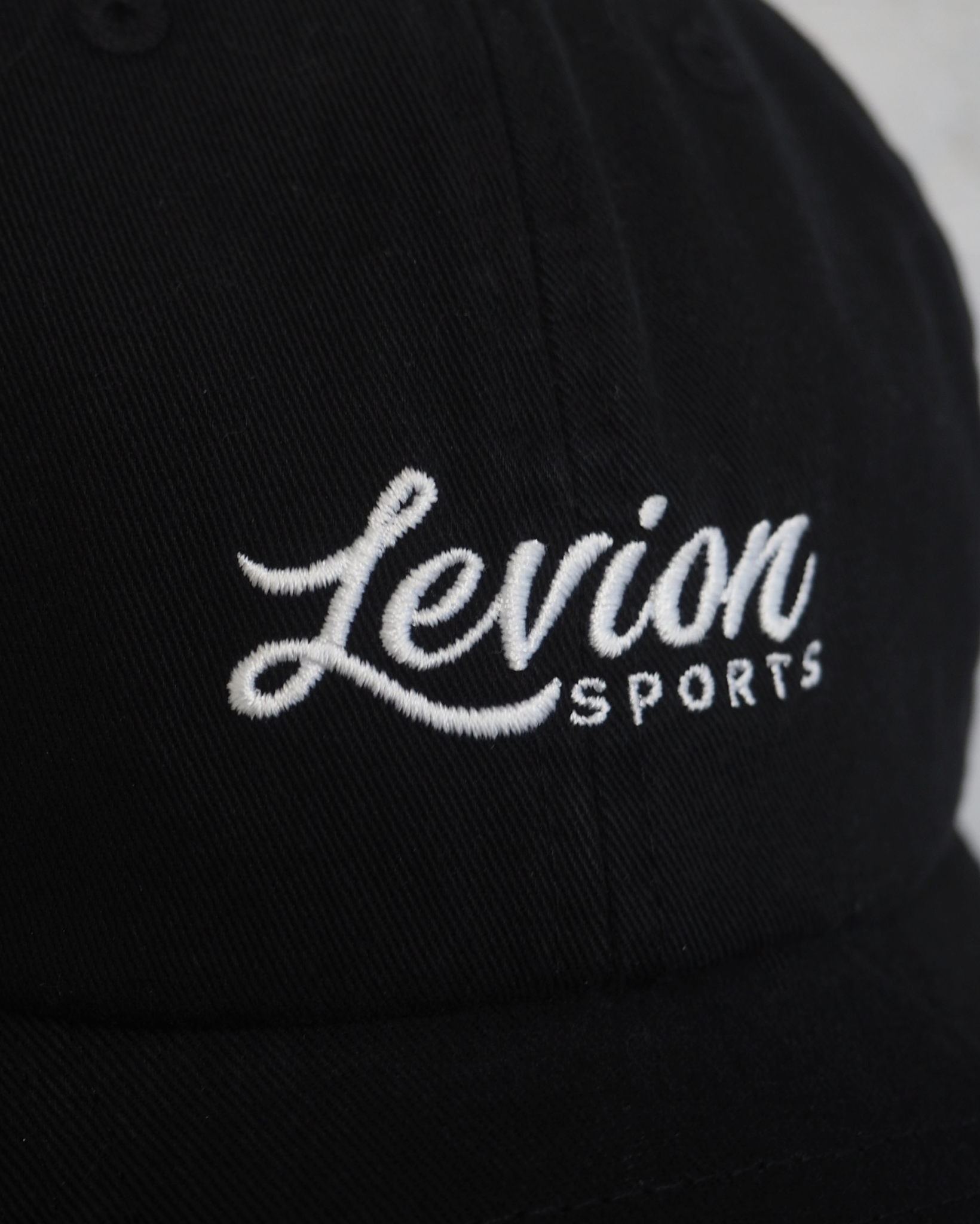 Levion Cursive Logo Cap - Black